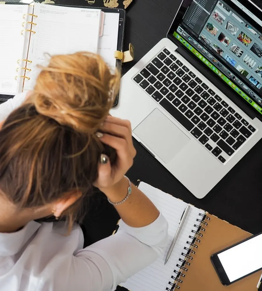 Overwhelmed student at a desk